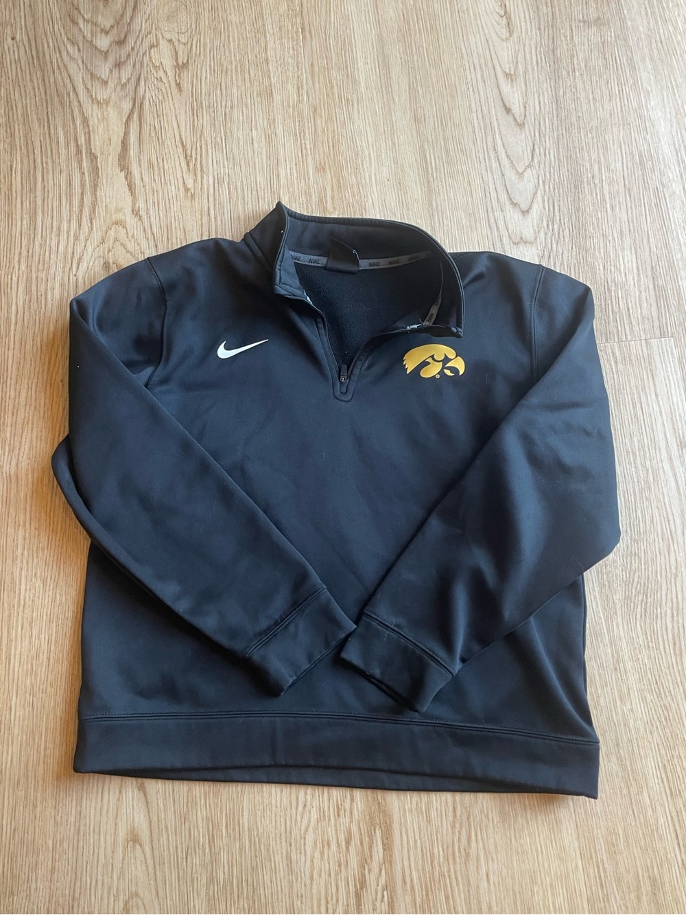 Nike Black Quarter-Zip Performance Pullover with Gold hawkeye Logo